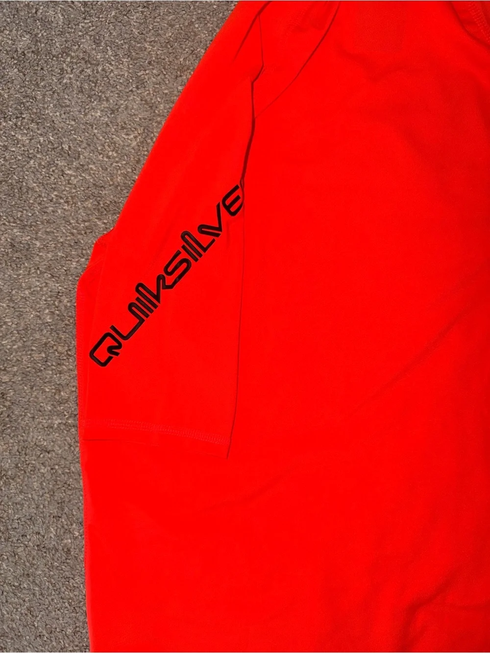 Quiksilver Men’s Neon Orange Short-Sleeve Rash Guard with Black Logo